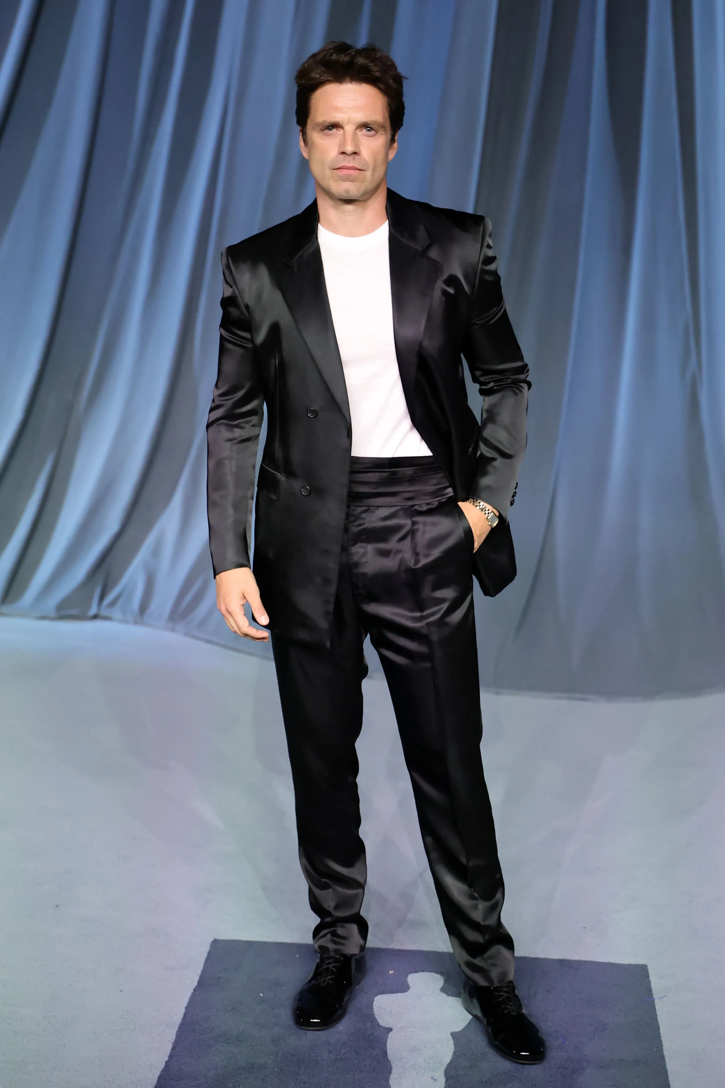 Sebastian Stan Masters Minimalist Power in a Black Satin Suit